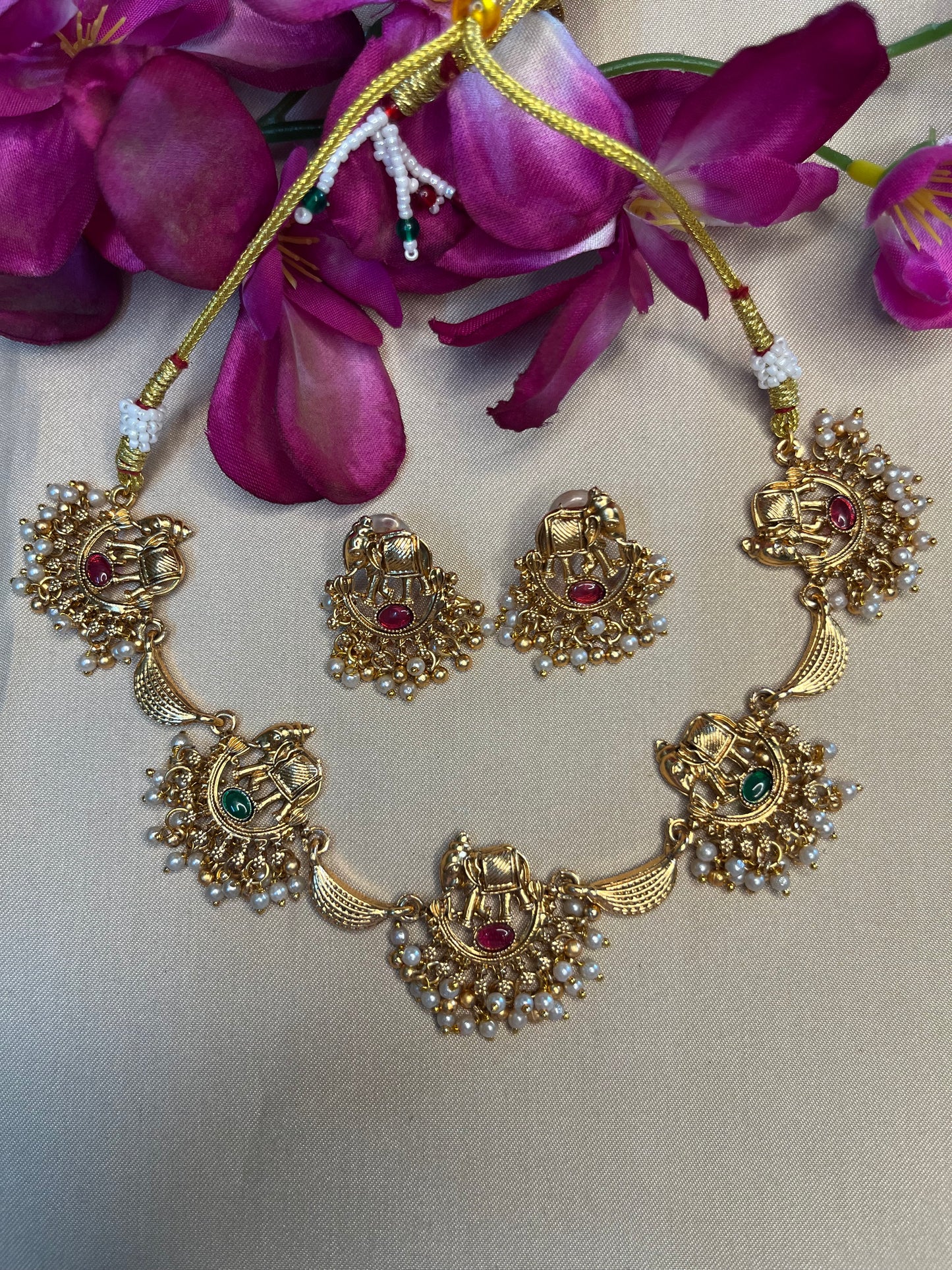 Antique choker with elephant motif and pearl droplet