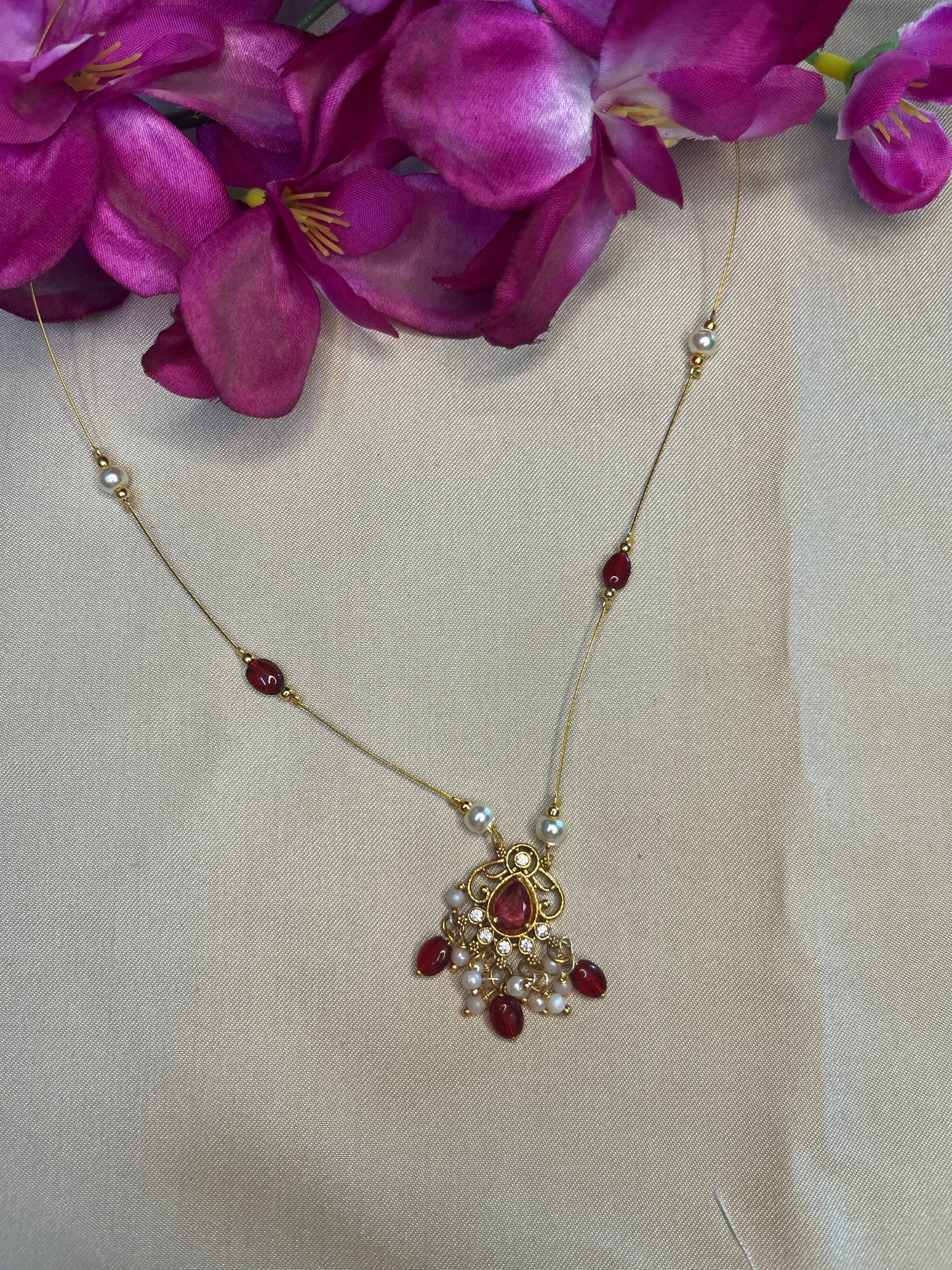 Maroon and gold studded invisible chain