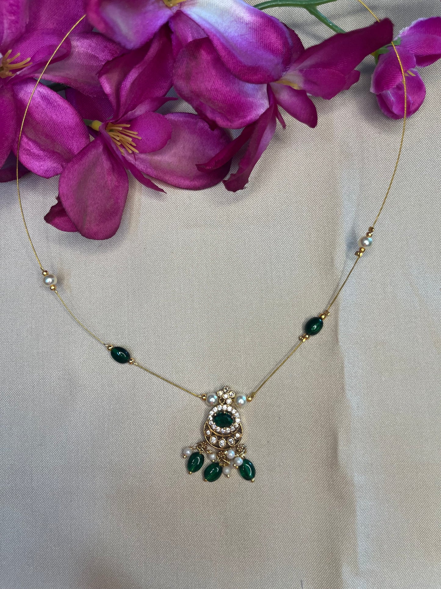 Pearl charm greenstone invisible chain