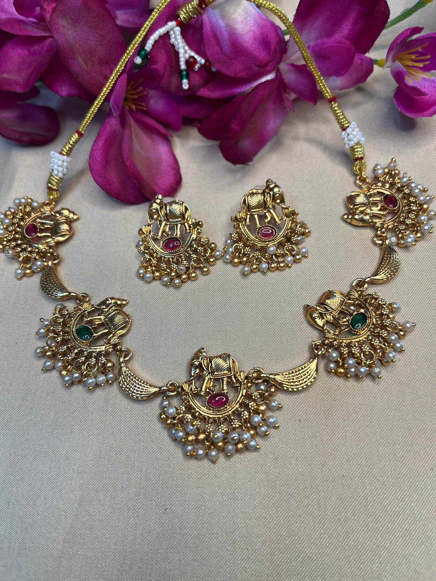 Antique choker with elephant motif and pearl droplet
