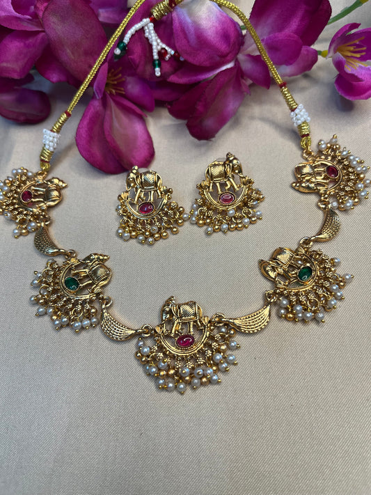 Antique choker with elephant motif and pearl droplet