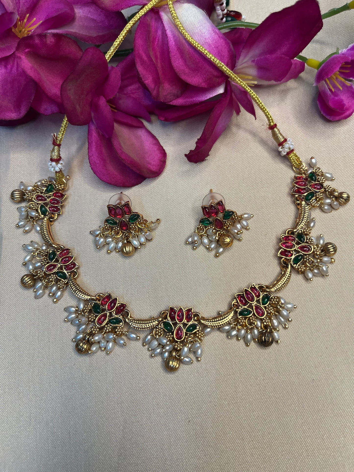 Lotus with pearl danglers