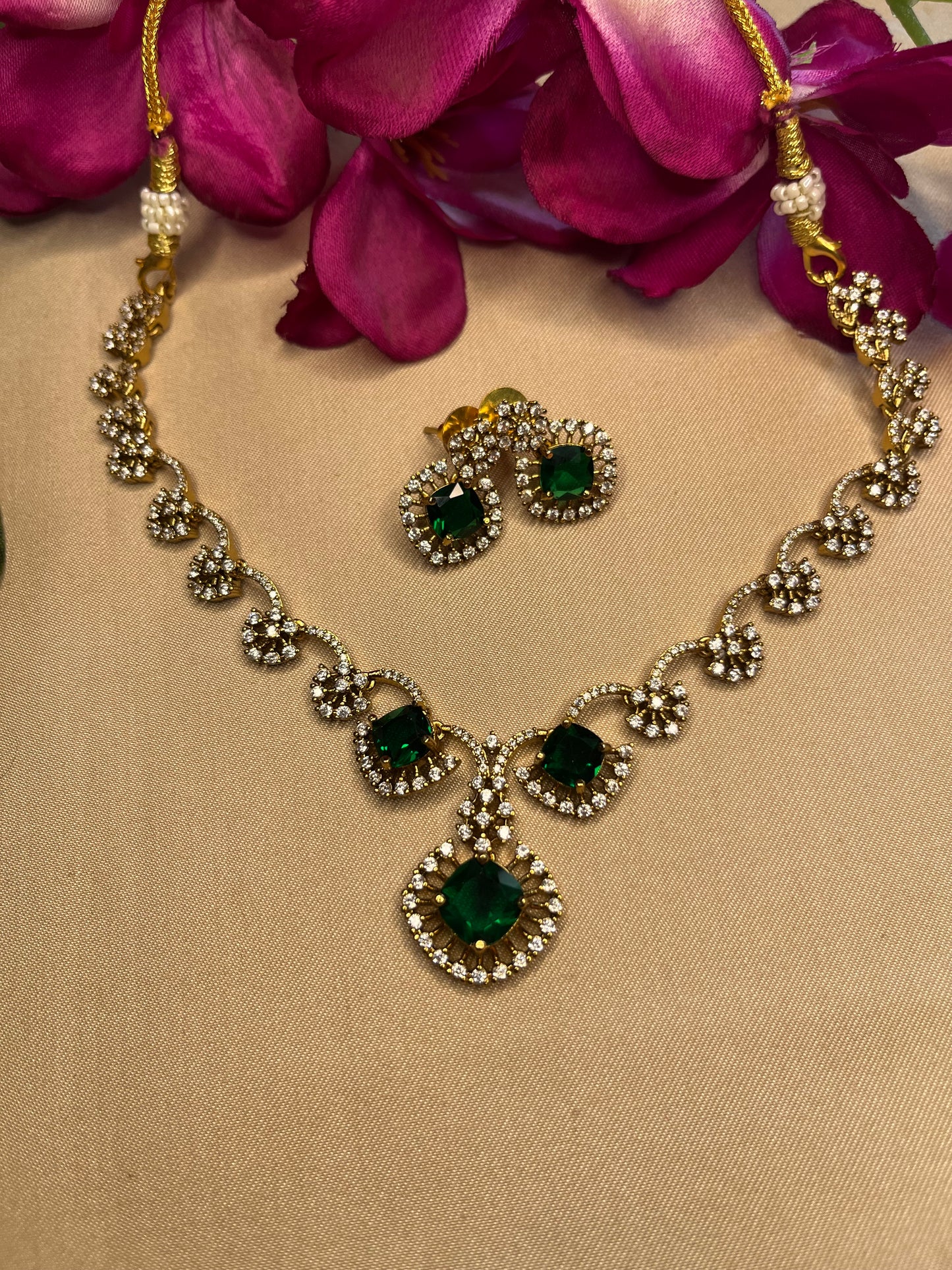 Emerald and white stone half flower choker
