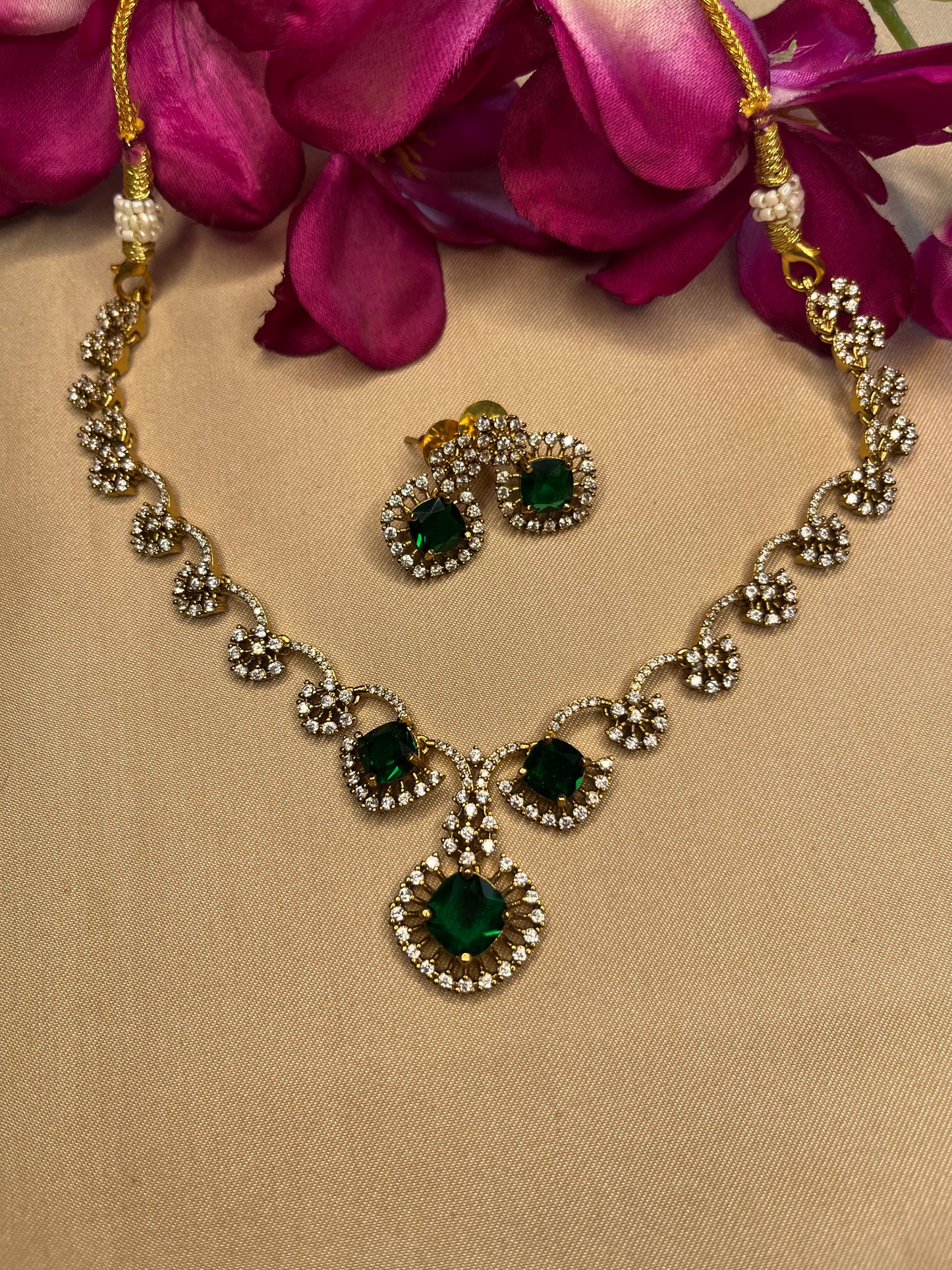 Emerald and white stone half flower choker