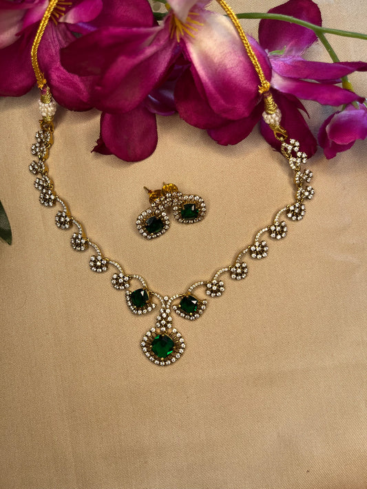 Emerald and white stone half flower choker