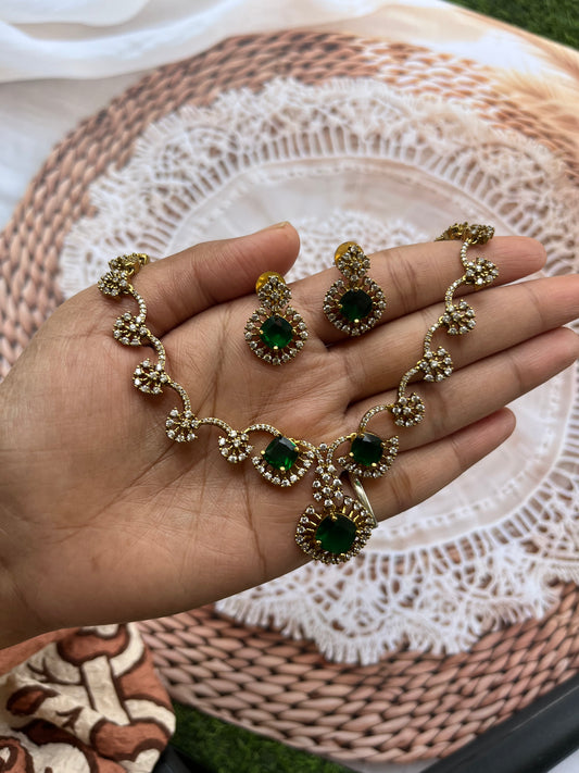 Emerald and white stone half flower choker